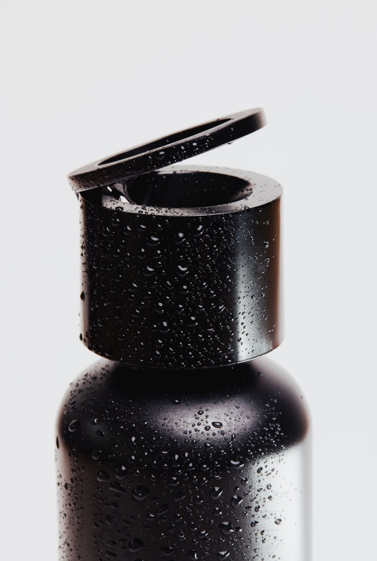 Refreshify Edelstahl Wasserflasche + Gratis Magnet Booster Ring