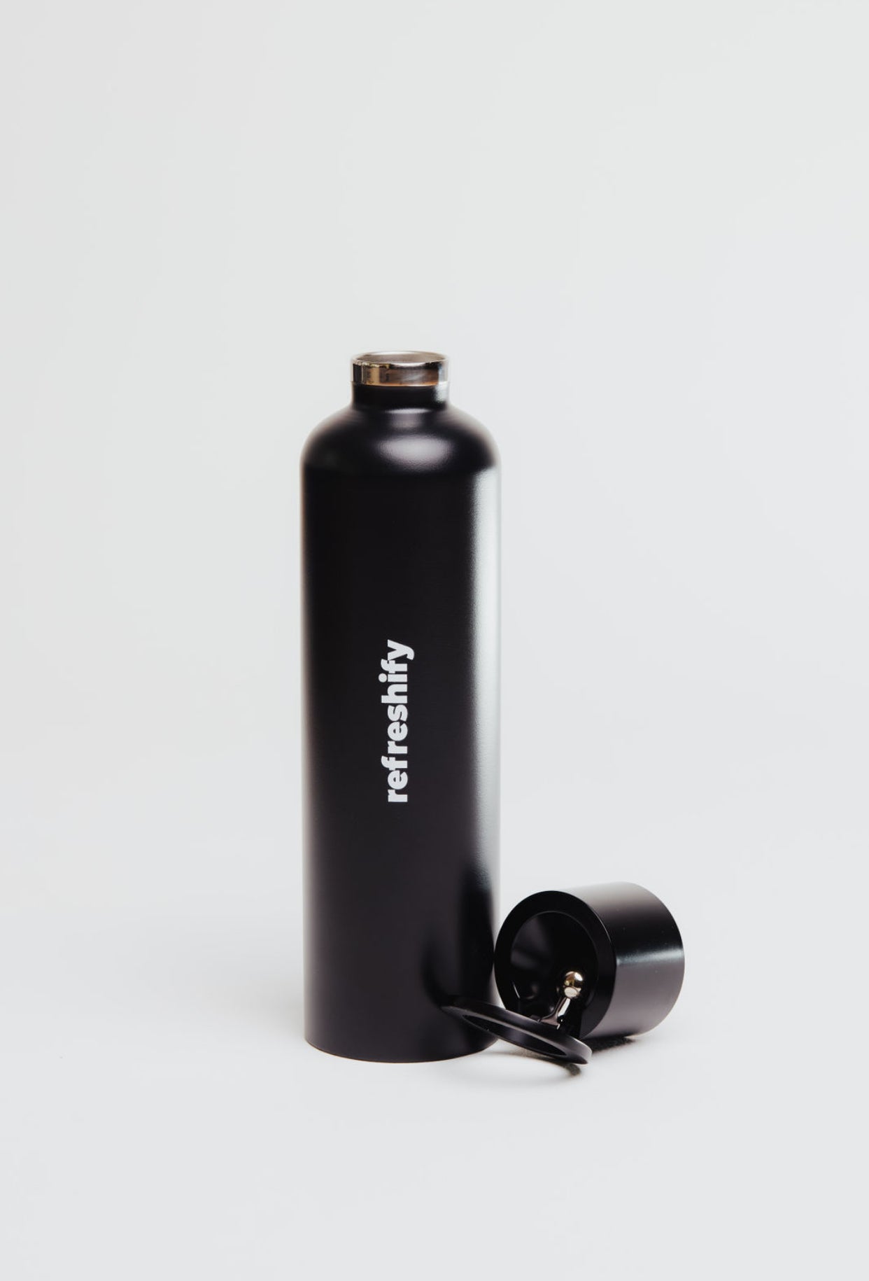 Refreshify Edelstahl Wasserflasche + Gratis Magnet Booster Ring